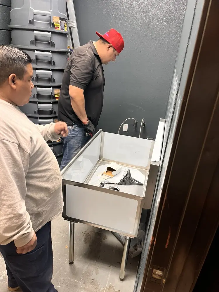 Commercial plumbing and sink installation in Bellerose